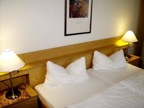 Imagen de la habitación del Hotel HAUS USEDOM Ferienwohnanlage mit Fr&uuml;hst&uuml;cks-Restaurant gegen&uuml;ber im Seeschl&ouml;sschen. Foto 13