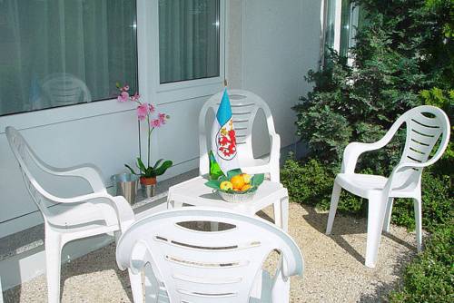 Imagen de la habitación del Hotel HAUS USEDOM Ferienwohnanlage mit Fr&uuml;hst&uuml;cks-Restaurant gegen&uuml;ber im Seeschl&ouml;sschen. Foto 14