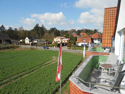 Imagen de la habitación del Hotel HAUS USEDOM Ferienwohnanlage mit Fr&uuml;hst&uuml;cks-Restaurant gegen&uuml;ber im Seeschl&ouml;sschen. Foto 15