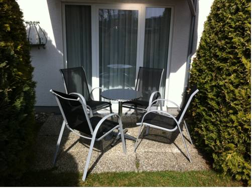 Imagen de la habitación del Hotel HAUS USEDOM Ferienwohnanlage mit Fr&uuml;hst&uuml;cks-Restaurant gegen&uuml;ber im Seeschl&ouml;sschen. Foto 16
