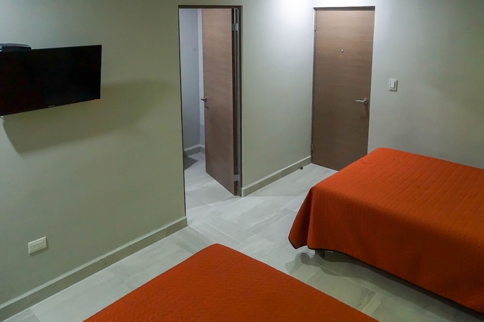 Imagen de la habitación del Hotel HC Express. Foto 9