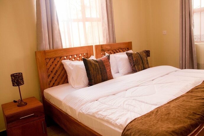 Imagen de la habitación del Hotel HECASA HOMESTAY. Foto 19