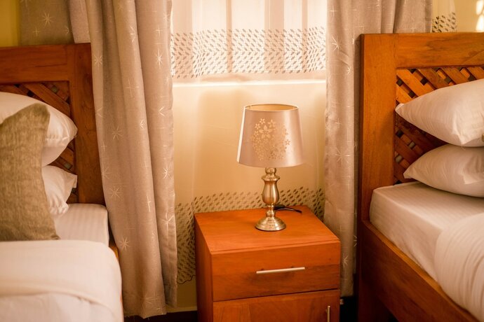 Imagen de la habitación del Hotel HECASA HOMESTAY. Foto 20