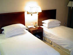Imagen de la habitación del Hotel HEJING BUSINESS. Foto 3