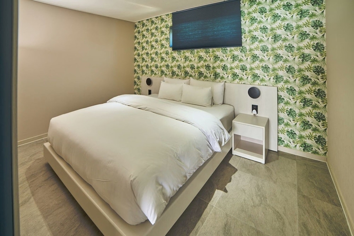 Imagen de la habitación del Hotel HEMIRION POOL VILLAandRESORT. Foto 10