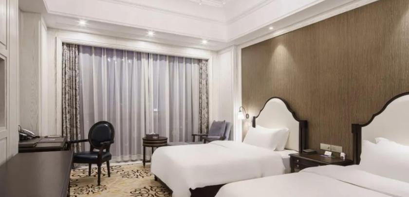 Imagen de la habitación del Hotel HENGMAI HOTEL. Foto 11