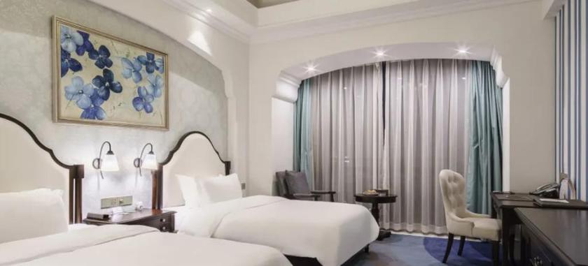 Imagen de la habitación del Hotel HENGMAI HOTEL. Foto 15