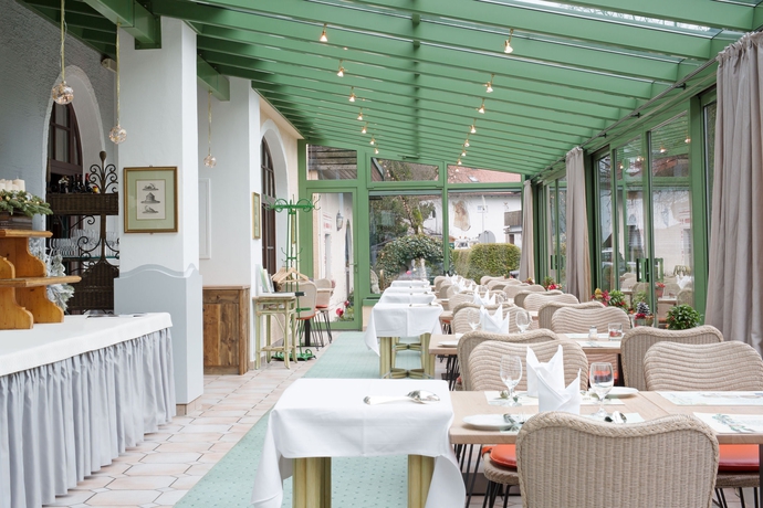 Imagen del bar/restaurante del Hotel HENRI Hotel Garmisch-Partenkirchen. Foto 4