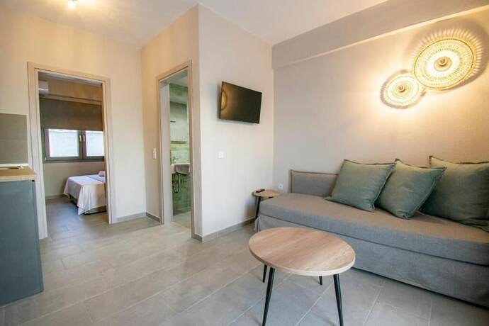 Imagen de la habitación del Hotel HERACLEA SUITES. Foto 18