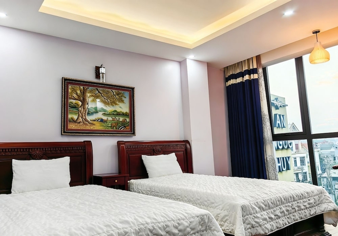 Imagen de la habitación del Hotel HEYI HOTEL. Foto 2