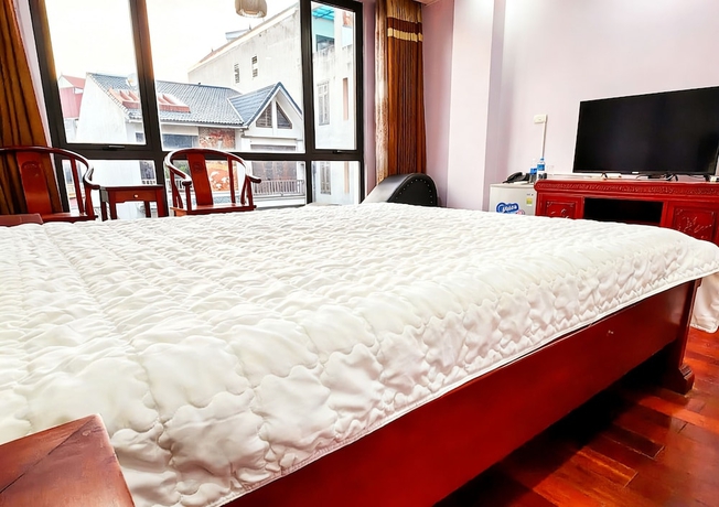 Imagen de la habitación del Hotel HEYI HOTEL. Foto 4