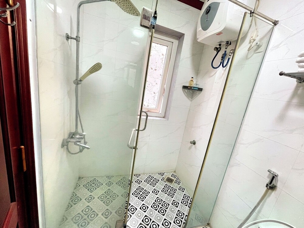Imagen de la habitación del Hotel HEYI HOTEL. Foto 7