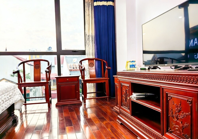 Imagen de la habitación del Hotel HEYI HOTEL. Foto 8
