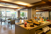 Imagen del bar/restaurante del Hotel HF Tuela Porto Ala Sul. Foto 3