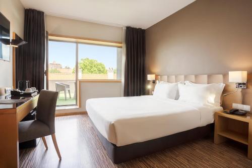 Imagen de la habitación del Hotel HF Tuela Porto. Foto 14