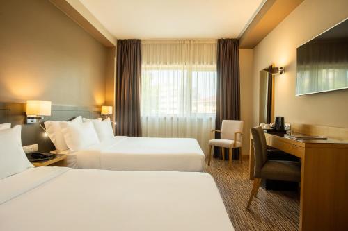 Imagen de la habitación del Hotel HF Tuela Porto. Foto 17