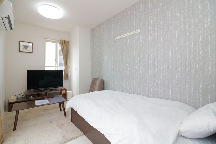 Imagen de la habitación del Hotel HG Cozy Hotel No.7. Foto 9