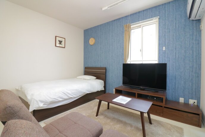 Imagen de la habitación del Hotel HG Cozy Hotel No.7. Foto 11