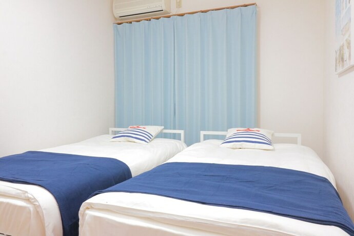 Imagen de la habitación del Hotel HG Cozy Hotel No.7. Foto 20