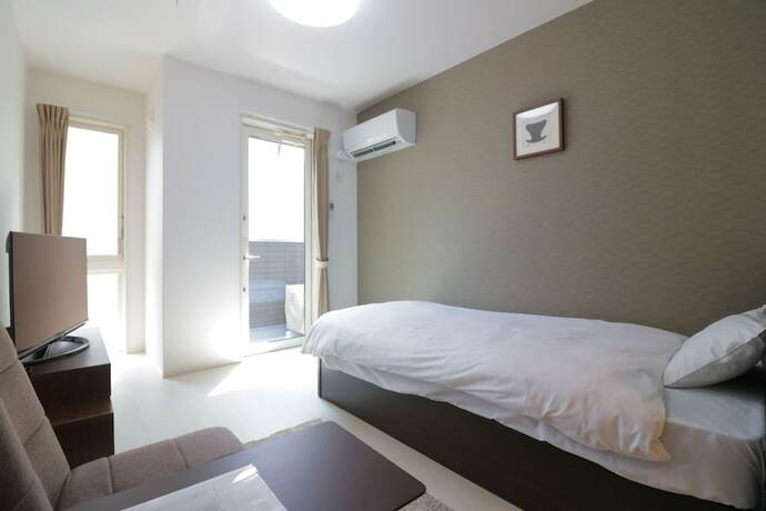 Imagen de la habitación del Hotel HG Cozy Hotel No.7. Foto 29