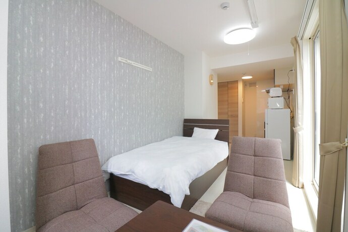 Imagen de la habitación del Hotel HG Cozy Hotel No.7. Foto 48