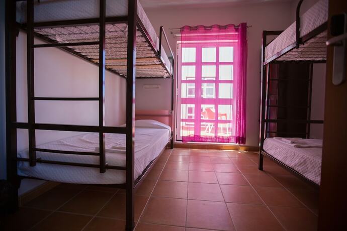 Imagen de la habitación del Hotel HI Portimão – Pousada de Juventude - Hostel. Foto 11