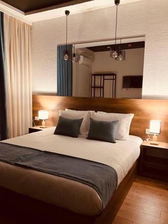 Imagen de la habitación del Hotel HILL HOTEL. Foto 18