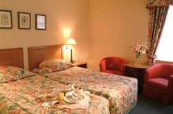 Imagen de la habitación del Hotel HILLTOP. Foto 4