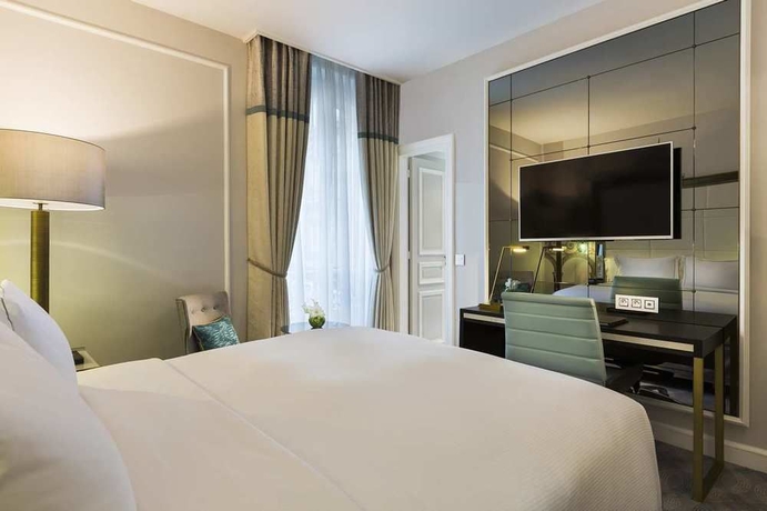 Imagen de la habitación del Hotel HILTON OPERA PARIS. Foto 2