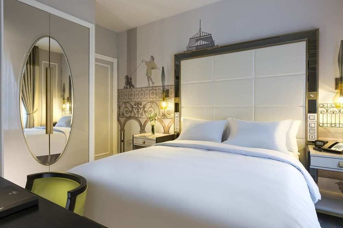Imagen de la habitación del Hotel HILTON OPERA PARIS. Foto 5