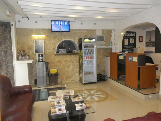 Imagen de los interiores del Hotel HIPOTEL PARIS MONTMARTRE GARE DU NORD. Foto 8