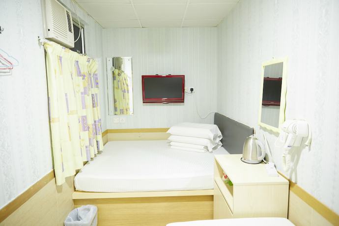 Imagen de la habitación del Hotel HK Haosheng. Foto 14