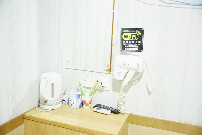 Imagen de la habitación del Hotel HK Haosheng. Foto 16