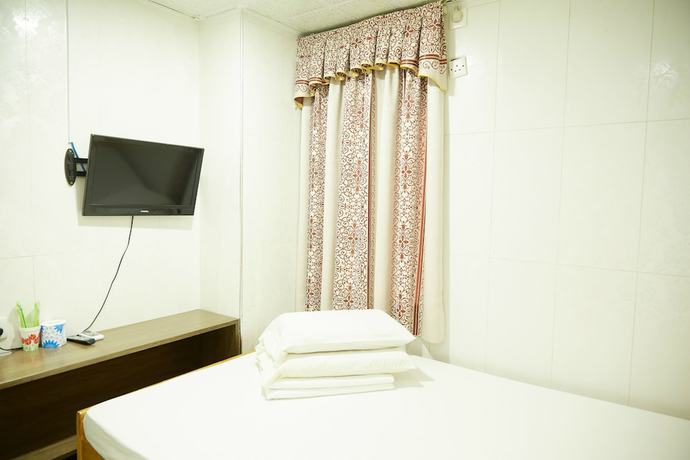 Imagen de la habitación del Hotel HK Haosheng. Foto 17