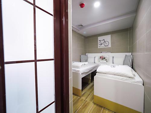 Imagen de la habitación del Hotel HK International Hostel, Kowloon. Foto 8