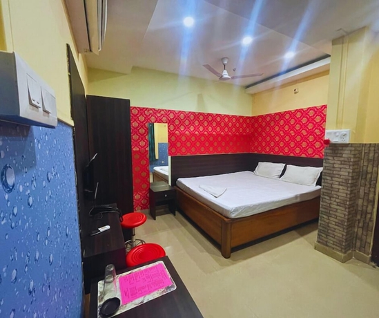 Imagen de la habitación del Hotel HK Residency. Foto 5