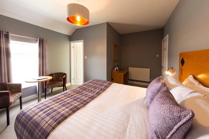 Imagen de la habitación del Hotel HK Rooms - Self Catering Serviced Rooms. Foto 19