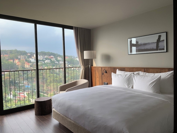 Imagen de la habitación del Hotel HLS Dalat Lodge. Foto 4