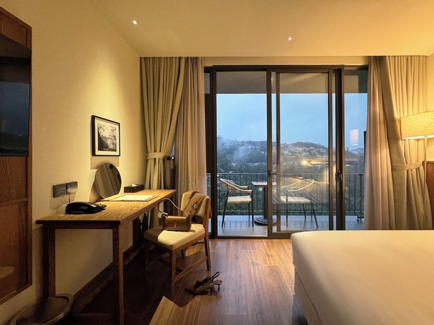 Imagen de la habitación del Hotel HLS Dalat Lodge. Foto 6