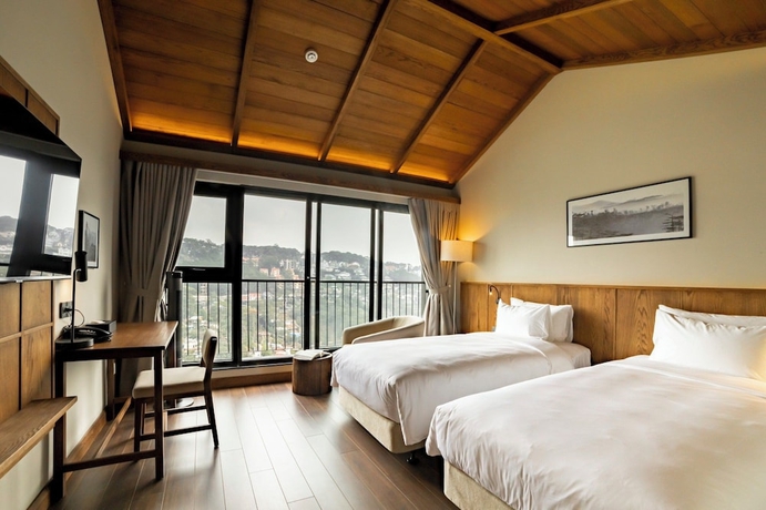 Imagen de la habitación del Hotel HLS Dalat Lodge. Foto 8