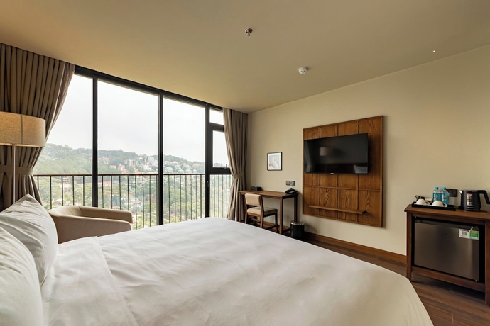 Imagen de la habitación del Hotel HLS Dalat Lodge. Foto 12