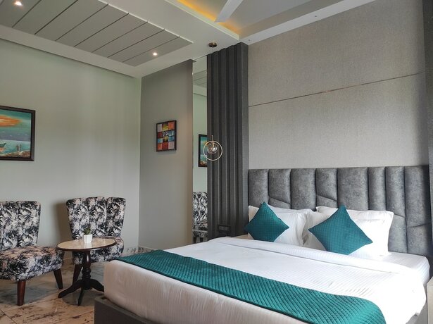 Imagen de la habitación del Hotel HM Resort, Dibrugarh. Foto 5