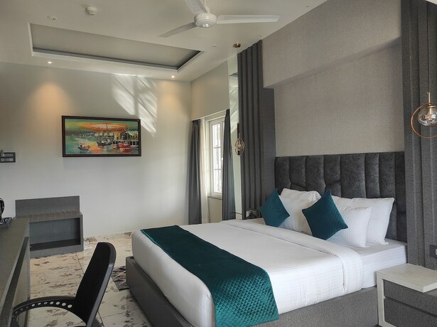 Imagen de la habitación del Hotel HM Resort, Dibrugarh. Foto 6