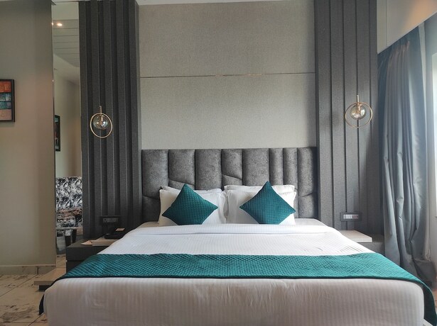 Imagen de la habitación del Hotel HM Resort, Dibrugarh. Foto 7