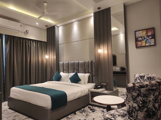 Imagen de la habitación del Hotel HM Resort, Dibrugarh. Foto 8