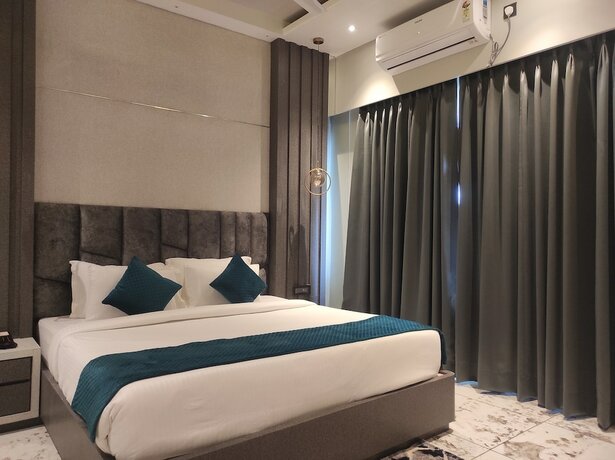 Imagen de la habitación del Hotel HM Resort, Dibrugarh. Foto 13