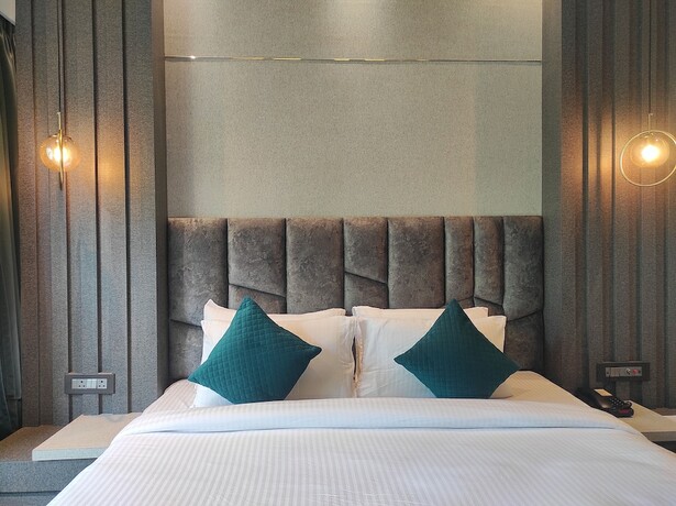 Imagen de la habitación del Hotel HM Resort, Dibrugarh. Foto 14