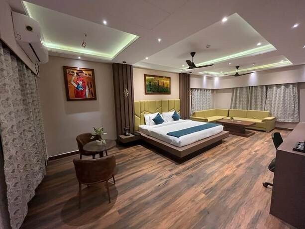 Imagen de la habitación del Hotel HM Resort, Dibrugarh. Foto 16
