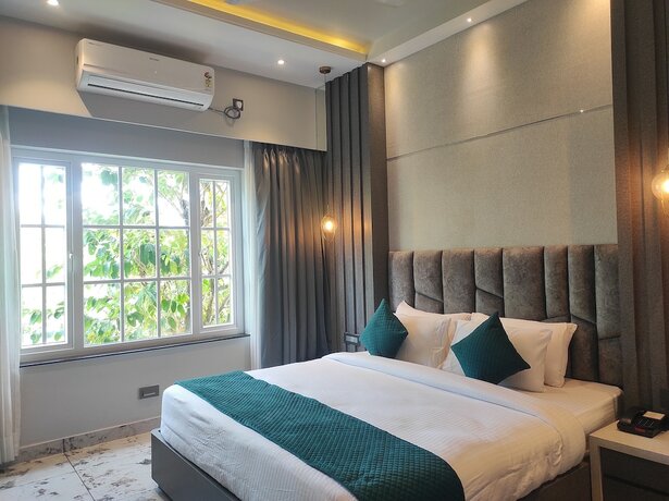 Imagen de la habitación del Hotel HM Resort, Dibrugarh. Foto 17