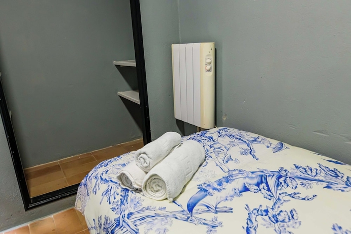Imagen de la habitación del Hotel HN Romero 18. Foto 15